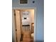 Bedroom featuring a view of the bed, painting, and attached bathroom at 1625 S Ocean Blvd. # 106, North Myrtle Beach, SC 29582