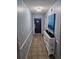 Charming hallway with ocean-themed decor, leading to the condo entrance and living spaces at 1625 S Ocean Blvd. # 106, North Myrtle Beach, SC 29582