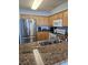 Well-equipped kitchen featuring granite countertops, stainless steel appliances, and ample cabinet space at 1625 S Ocean Blvd. # 106, North Myrtle Beach, SC 29582