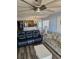 Cozy living room with hardwood floors, modern furnishings, and an open layout to the kitchen and dining area at 1625 S Ocean Blvd. # 106, North Myrtle Beach, SC 29582