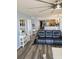 Comfortable living room featuring hard wood floors, modern furniture, open to dining and kitchen at 1625 S Ocean Blvd. # 106, North Myrtle Beach, SC 29582