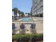 Well-maintained pool area with lounge chairs and a partial view of the building at 1625 S Ocean Blvd. # 106, North Myrtle Beach, SC 29582