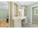 Bathroom vanity with seating, shelving, and drawers for easy access at 1676 Elder Ln., Galivants Ferry, SC 29544