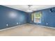 Bedroom with blue walls, carpet flooring, and a ceiling fan at 1676 Elder Ln., Galivants Ferry, SC 29544