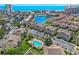 Aerial view features beach front condos, community pools, waterways, golf course, and nearby ocean at 1900 Duffy St. # A8, North Myrtle Beach, SC 29582