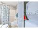 Bathroom featuring shower/tub combo and stacked washer and dryer at 1900 Duffy St. # A8, North Myrtle Beach, SC 29582