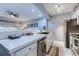 Well-lit kitchen featuring modern appliances and a convenient layout for cooking and entertaining at 1900 Duffy St. # A8, North Myrtle Beach, SC 29582