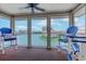 Relaxing screened porch with comfortable seating and scenic views of the surrounding lake at 1900 Duffy St. # A8, North Myrtle Beach, SC 29582