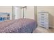 Bedroom featuring soft lighting, carpeted floors, and a light, whitewashed dresser at 200 Castle Dr. # 1369, Myrtle Beach, SC 29579