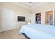 Bright main bedroom featuring a walk-in closet and ensuite bathroom access at 200 Castle Dr. # 1369, Myrtle Beach, SC 29579