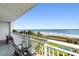 Enjoy the ocean view from the spacious balcony with seating, perfect for relaxing at 2000 N Ocean Blvd. # 301, Myrtle Beach, SC 29577