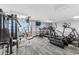 Bright gym with ocean views and various exercise equipment at 2000 N Ocean Blvd. # 301, Myrtle Beach, SC 29577