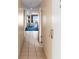 Hallway with tile floor leading to a bedroom with a view of the ocean at 2000 N Ocean Blvd. # 301, Myrtle Beach, SC 29577