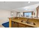 Kitchen with breakfast bar overlooking the living area and beautiful views of the ocean at 2000 N Ocean Blvd. # 301, Myrtle Beach, SC 29577