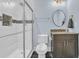 Bathroom with shower, tile surround, modern vanity and stylish fixtures at 2004 Crow Field Ct., Myrtle Beach, SC 29579
