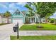 Inviting curb appeal with a lush green lawn, mature landscaping, and a charming two-car garage at 2004 Crow Field Ct., Myrtle Beach, SC 29579