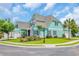 Beautiful two-story home with a well-manicured lawn, charming curb appeal, and street sign at 2004 Crow Field Ct., Myrtle Beach, SC 29579