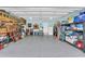 Organized garage with epoxy floor and shelving units, maximizing storage and utility at 2004 Crow Field Ct., Myrtle Beach, SC 29579