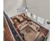Aerial view of the expansive open-concept living room with hardwood floors and neutral decor at 2004 Crow Field Ct., Myrtle Beach, SC 29579