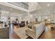 Spacious open-concept living room with hardwood floors, high ceilings, and abundant natural light at 2004 Crow Field Ct., Myrtle Beach, SC 29579