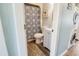 Cozy bathroom featuring a shower, sink, and a mirror at 204 Maison Dr. # N304, Myrtle Beach, SC 29572