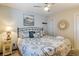 Inviting bedroom with a cozy bed and a decorative mirror at 204 Maison Dr. # N304, Myrtle Beach, SC 29572
