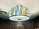 Eye-catching ceiling light with a colorful stained glass design at 204 Maison Dr. # N304, Myrtle Beach, SC 29572