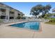 Community pool with fencing, lounge chairs, and landscaped areas at 204 Maison Dr. # N304, Myrtle Beach, SC 29572