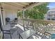 Relaxing balcony with outdoor seating, perfect for enjoying serene views at 206 Maison Dr. # Q-204, Myrtle Beach, SC 29572