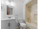 A well-lit bathroom featuring a sink vanity, toilet and shower/tub combo at 206 Maison Dr. # Q-204, Myrtle Beach, SC 29572