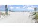 Beautiful beach access with soft sand, clear skies, and calming ocean view at 206 Maison Dr. # Q-204, Myrtle Beach, SC 29572