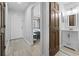 Hallway view with bedroom, bathroom, and entry featuring modern decor at 206 Maison Dr. # Q-204, Myrtle Beach, SC 29572
