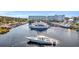 Beautiful marina view featuring docked boats, the building exterior, and waterfront location at 2100 Sea Mountain Hwy. # 224, North Myrtle Beach, SC 29582