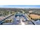 An aerial view of the marina and waterfront property, showcasing the buildings, bridges, and harbor at 2100 Sea Mountain Hwy. # 224, North Myrtle Beach, SC 29582