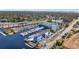 A breathtaking aerial view highlights the waterfront marina, showcasing docked boats and the surrounding landscape at 2100 Sea Mountain Hwy. # 224, North Myrtle Beach, SC 29582