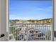 Scenic balcony view featuring a bustling marina, waterway, and the bridge in the background at 2100 Sea Mountain Hwy. # 224, North Myrtle Beach, SC 29582