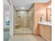 Bright bathroom featuring tiled shower with seat, vanity, and tile flooring at 2100 Sea Mountain Hwy. # 224, North Myrtle Beach, SC 29582