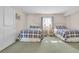 Bedroom featuring two beds with blue patterned comforters, side tables and lamps at 2100 Sea Mountain Hwy. # 224, North Myrtle Beach, SC 29582