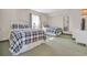 Bright bedroom featuring two beds with blue patterned comforters and coastal decor at 2100 Sea Mountain Hwy. # 224, North Myrtle Beach, SC 29582