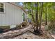 Landscaped backyard with patio off the rear access of home at 2128 Adams Circle, Little River, SC 29566