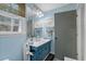 Cozy bathroom with window at 2128 Adams Circle, Little River, SC 29566