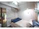 Cozy bedroom with a ceiling fan and sliding closet door at 2128 Adams Circle, Little River, SC 29566