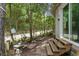 Exterior side access with wood stairs at 2128 Adams Circle, Little River, SC 29566