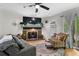 Inviting living room with fireplace, hardwood floors, and neutral decor, creating a comfortable space at 2128 Adams Circle, Little River, SC 29566