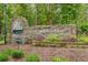Stone community entrance sign with the name Windjammer Village and nautical decor surrounded by foliage at 2128 Adams Circle, Little River, SC 29566