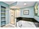 Spa-like bathroom with walk-in shower, soaking tub, and built in shelving at 2151 Bridge View Ct. # 2302, North Myrtle Beach, SC 29582