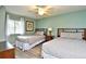 Inviting bedroom with two beds, and a window with natural light at 2151 Bridge View Ct. # 2302, North Myrtle Beach, SC 29582