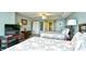 Bright bedroom with two beds, television, and ample closet space at 2151 Bridge View Ct. # 2302, North Myrtle Beach, SC 29582