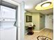 Welcoming entryway featuring tiled floor, and convenient washer and dryer at 2151 Bridge View Ct. # 2302, North Myrtle Beach, SC 29582