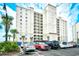 Exterior of a beachfront condo featuring multiple floors, balconies, and convenient parking at 2151 Bridge View Ct. # 2302, North Myrtle Beach, SC 29582